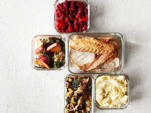 Containers of leftovers from a Thanksgiving dinner.